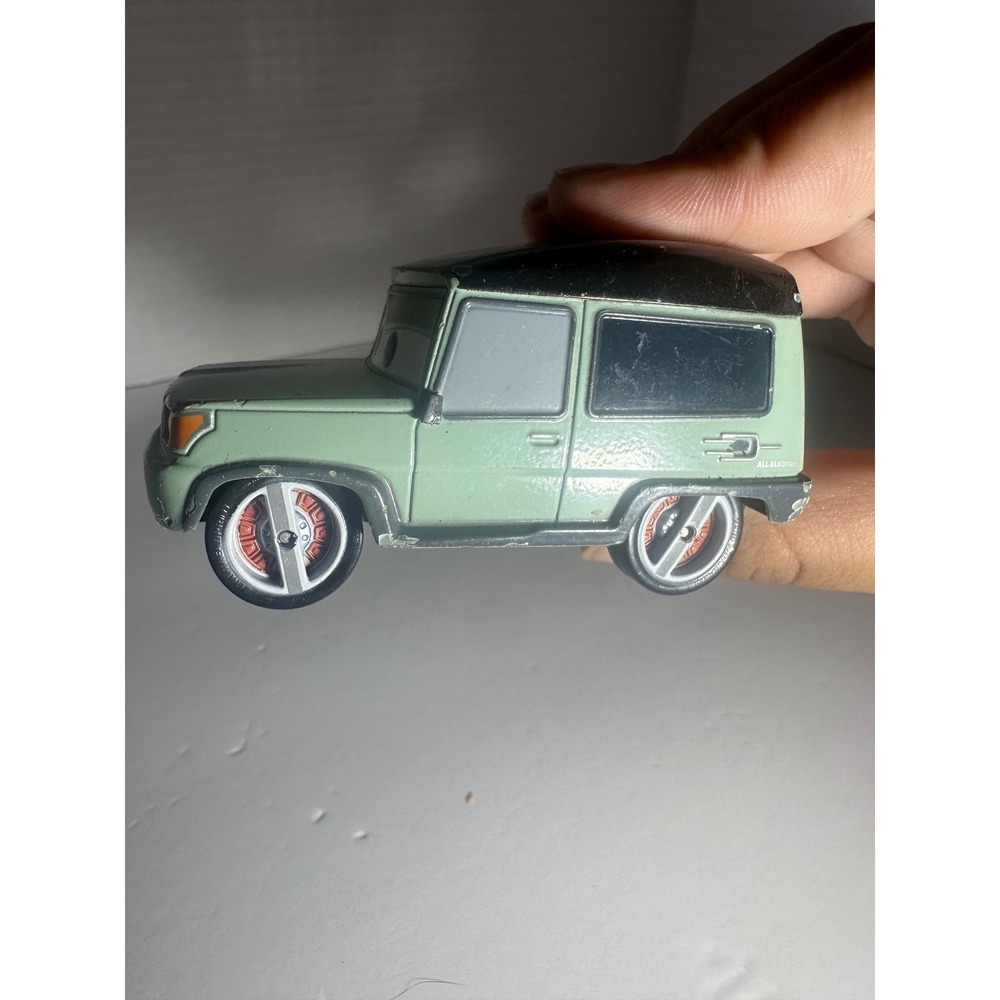 Disney Pixar Cars Sir Miles Axlerod Green Diecast Toy Car Cars 2 - Picture 5 of 11